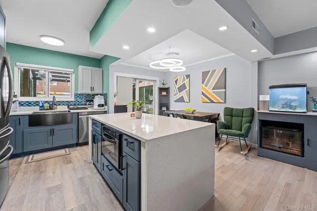 a kitchen with a stove and a sink
