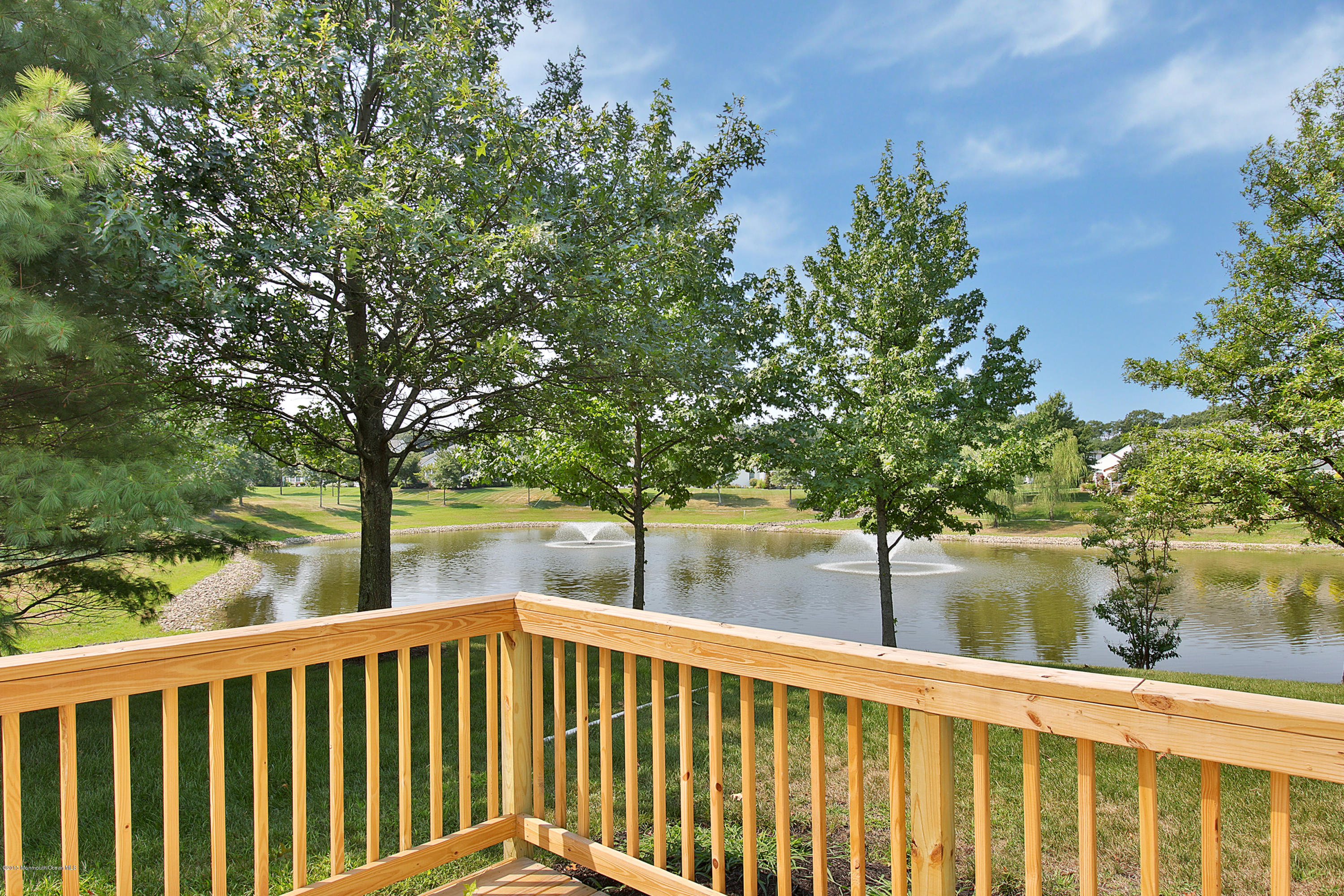 2600 Collier Road Manasquan, NJ 08736 - Photo 30 of 37 Rear Deck Overlooks Pond