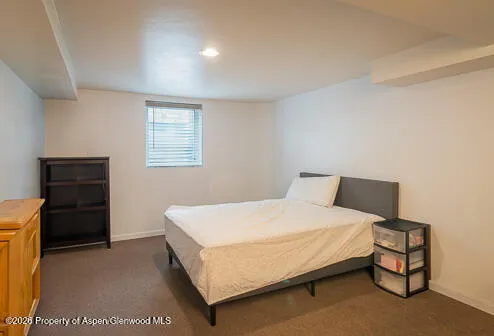 a room with a table and a window