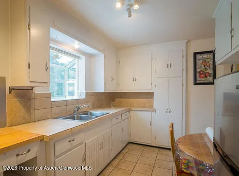 a front view of a house with garage