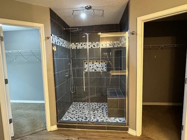 2155 Hagood Loop Crestview, FL 32536 - Photo 9 of 16 a bathroom with a glass shower door