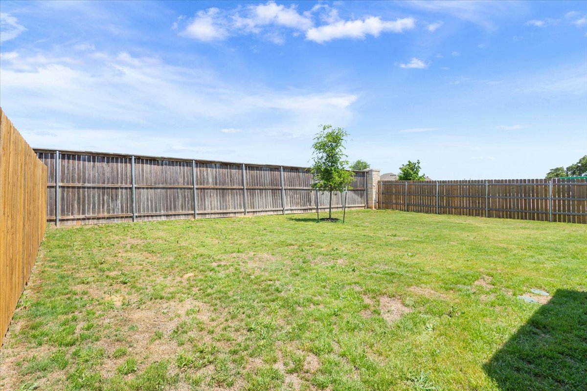 5830 Copano Road Belton, TX 76513 - Photo 33 of 34 View of yard featuring a fenced backyard