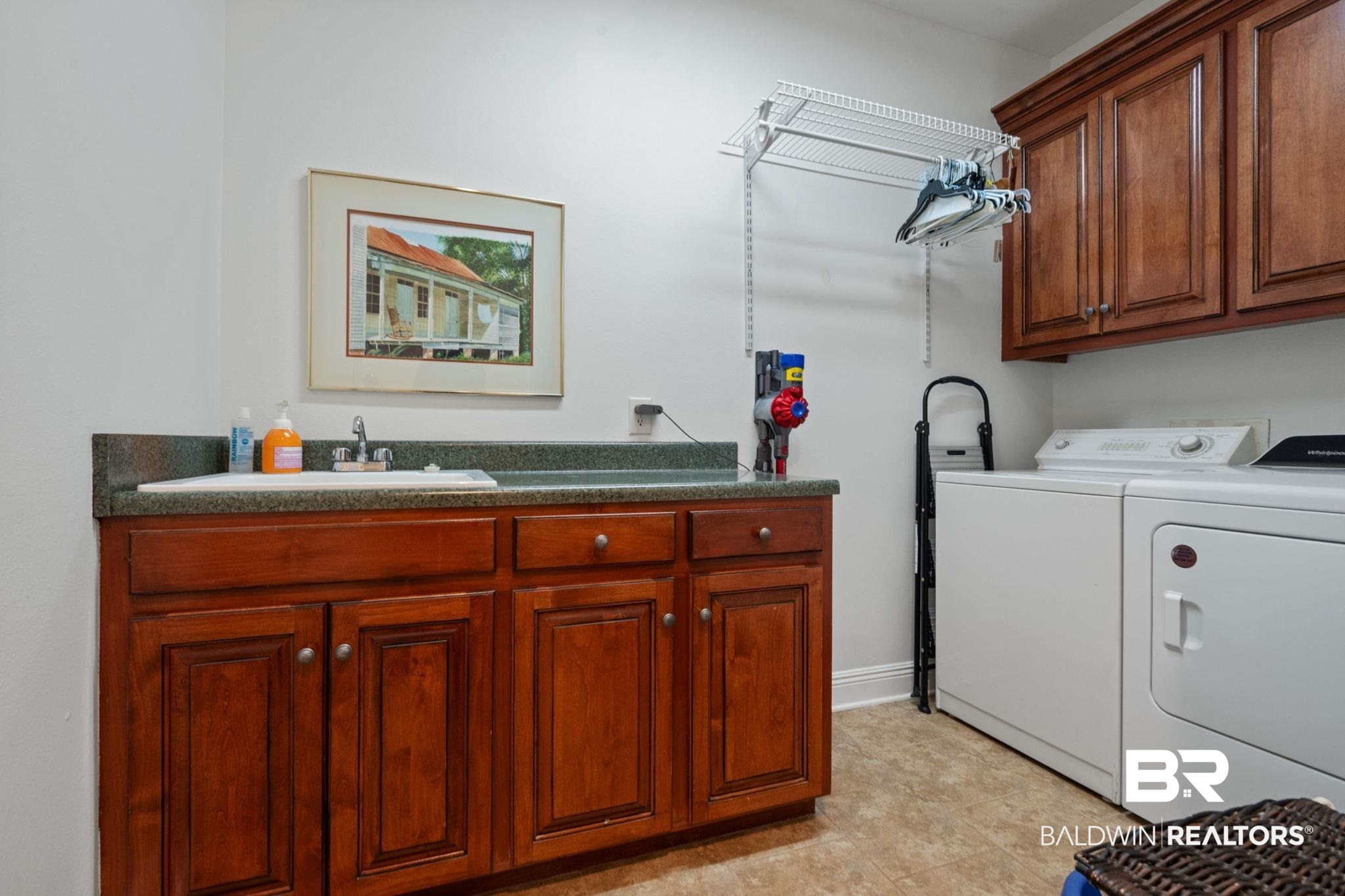 4771 Pecan Ridge East Mobile, AL 36619 - Photo 43 of 48 Laundry area featuring cabinet space and washing machine and clothes dryer