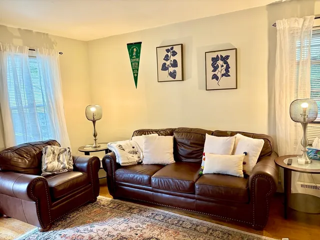 a living room with furniture and a couch