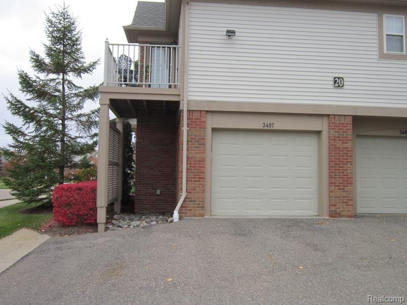 3487 Tremonte Circle, Unit 215 Rochester, MI 48306 - Photo 14 of 14 Garageoutside.jpg