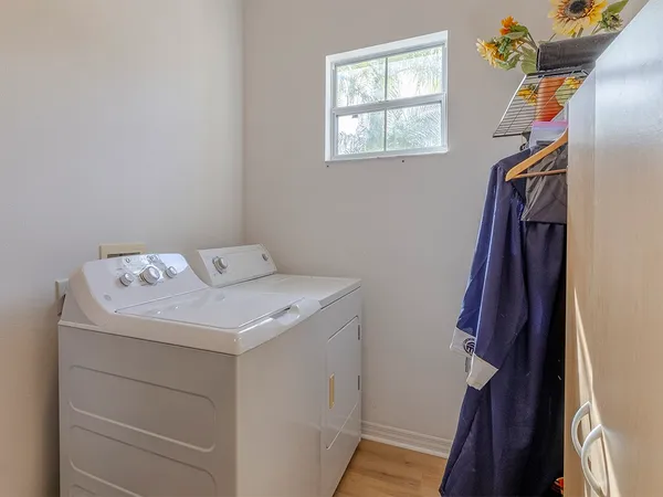 a utility room with dryer and washer
