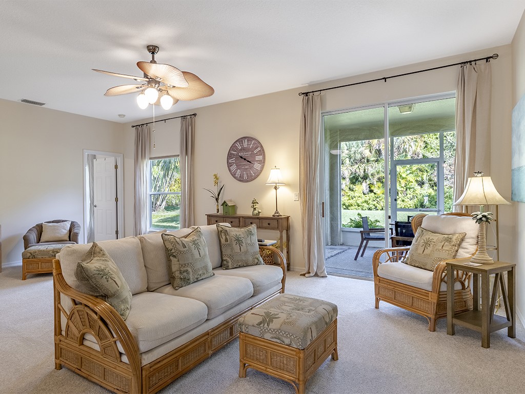 3648 2nd Street Southwest Vero Beach, FL 32968 - Photo 4 of 36 a living room with furniture and a large window