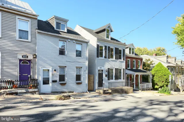 a front view of a building with street view
