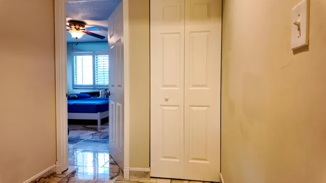 a view of a hallway with interior of the house