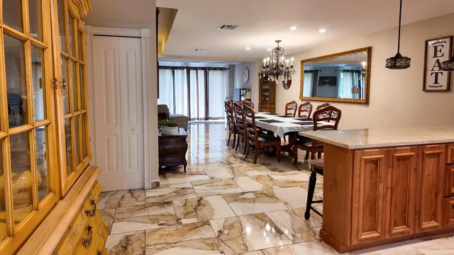 a view of a dining room with furniture