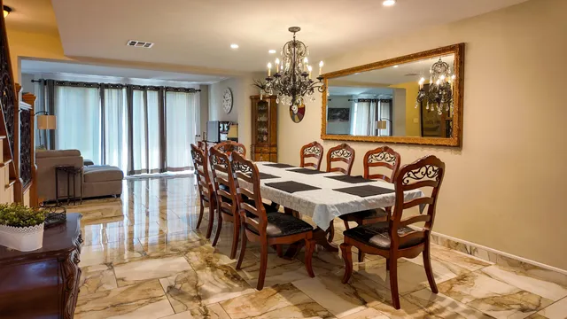 a view of a dining room with furniture