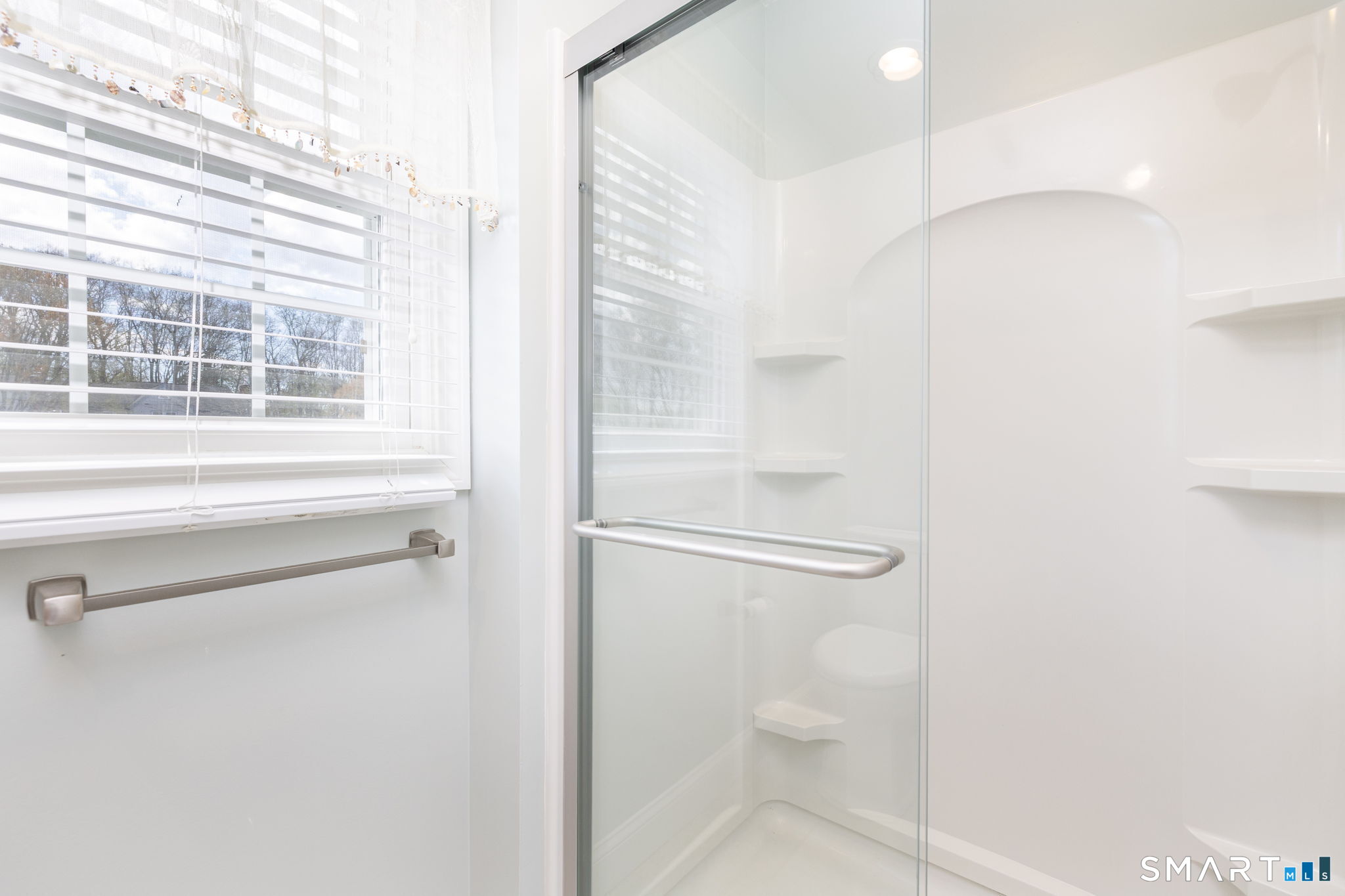 85 Gate Ridge Road, Unit 85 Fairfield, CT 06825 - Photo 25 of 38 a bathroom with a shower and a toilet