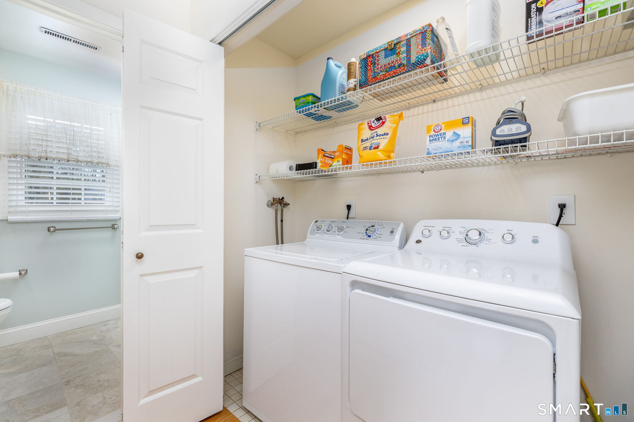 85 Gate Ridge Road, Unit 85 Fairfield, CT 06825 - Photo 26 of 38 a utility room with dryer and washer