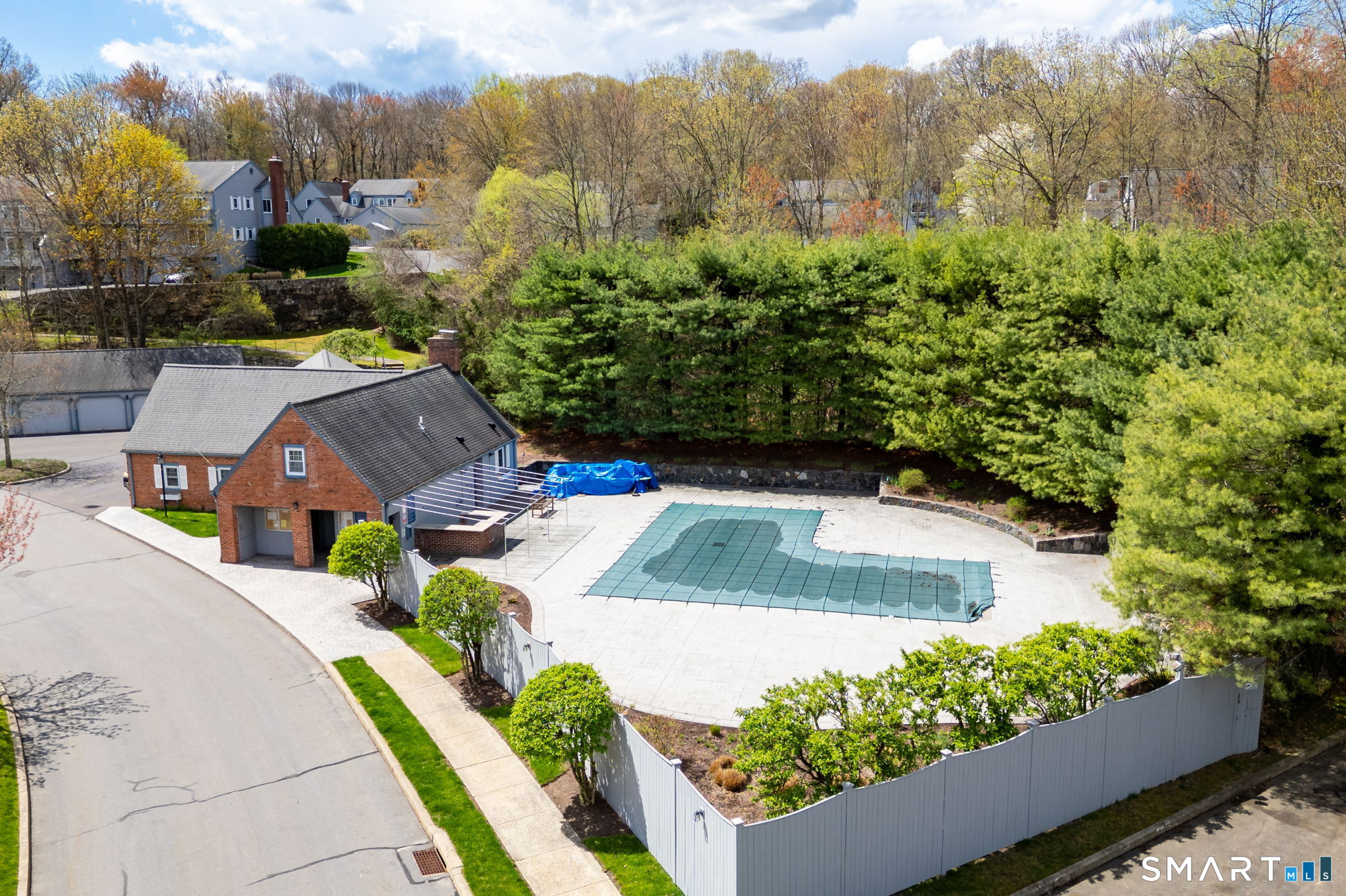 85 Gate Ridge Road, Unit 85 Fairfield, CT 06825 - Photo 36 of 38 a view of a house with a yard and sitting area