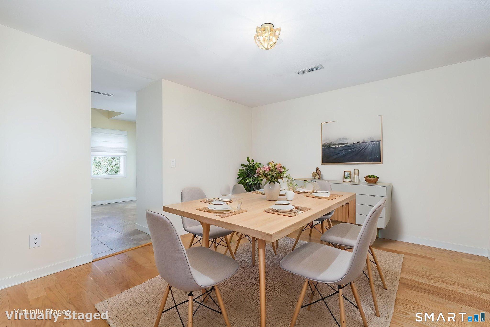85 Gate Ridge Road, Unit 85 Fairfield, CT 06825 - Photo 9 of 38 a view of a dining room with furniture