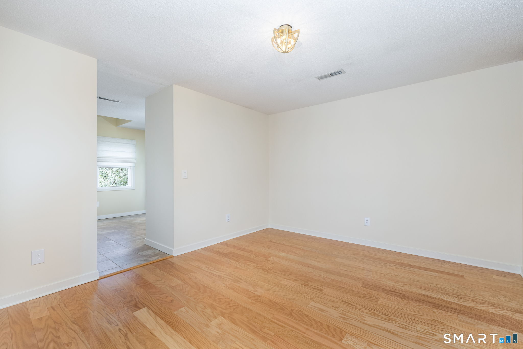 85 Gate Ridge Road, Unit 85 Fairfield, CT 06825 - Photo 10 of 38 a view of empty room