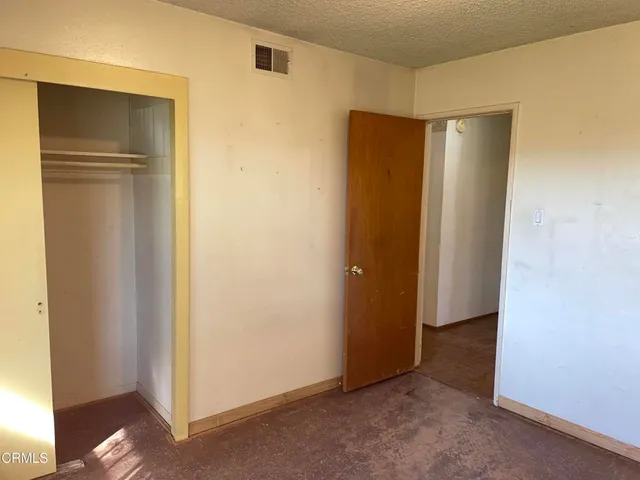 a bathroom with a tub and shower