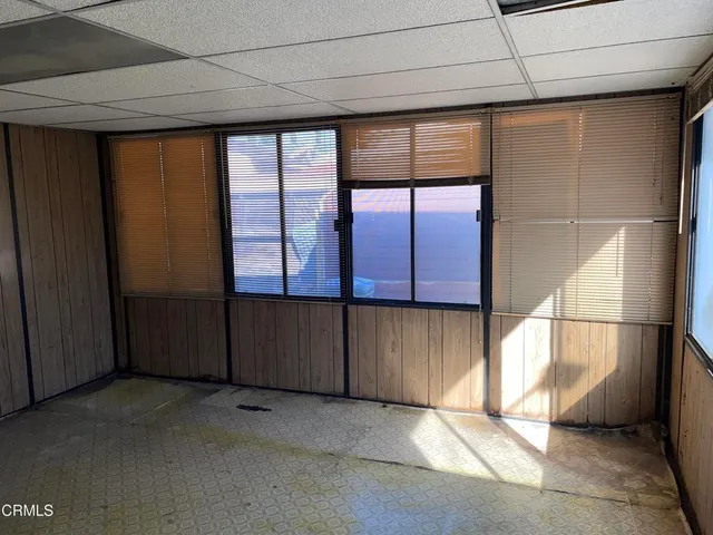 a view of a porch with a yard