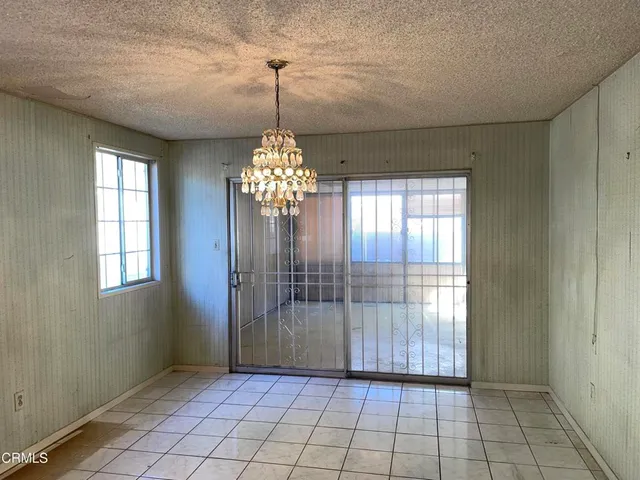 a kitchen with a stove and a microwave