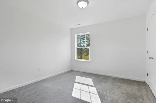 a bathroom with a sink a vanity and a mirror