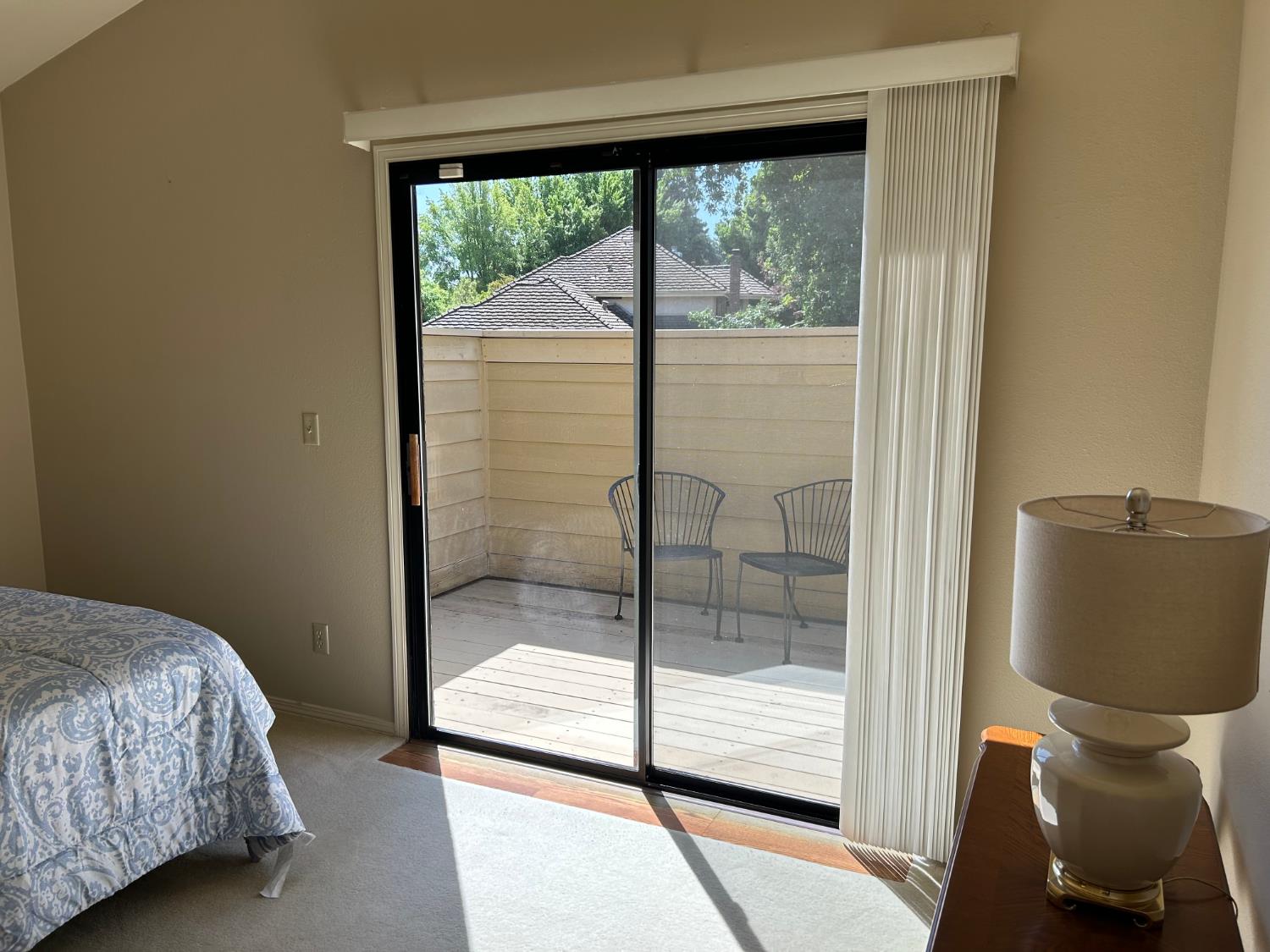 1067 Rio Cidade Way Sacramento, CA 95831 - Photo 20 of 33 a bedroom with a balcony and a bed