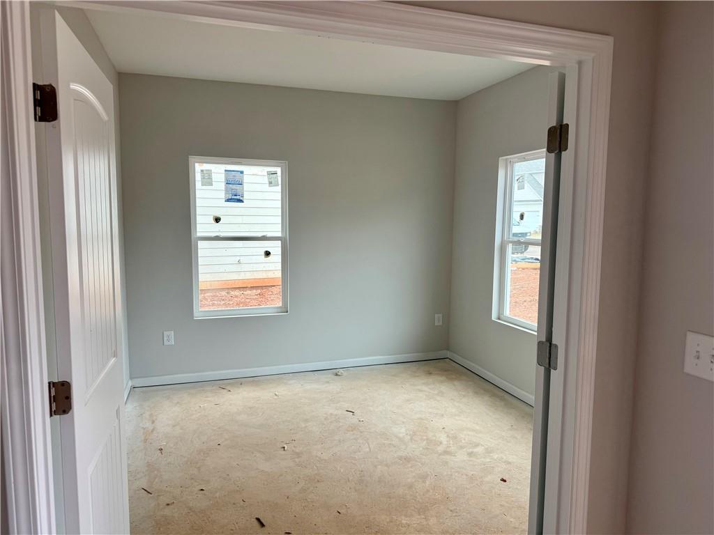 501 Charleston Place Villa Rica, GA 30180 - Photo 3 of 18 an empty room with windows