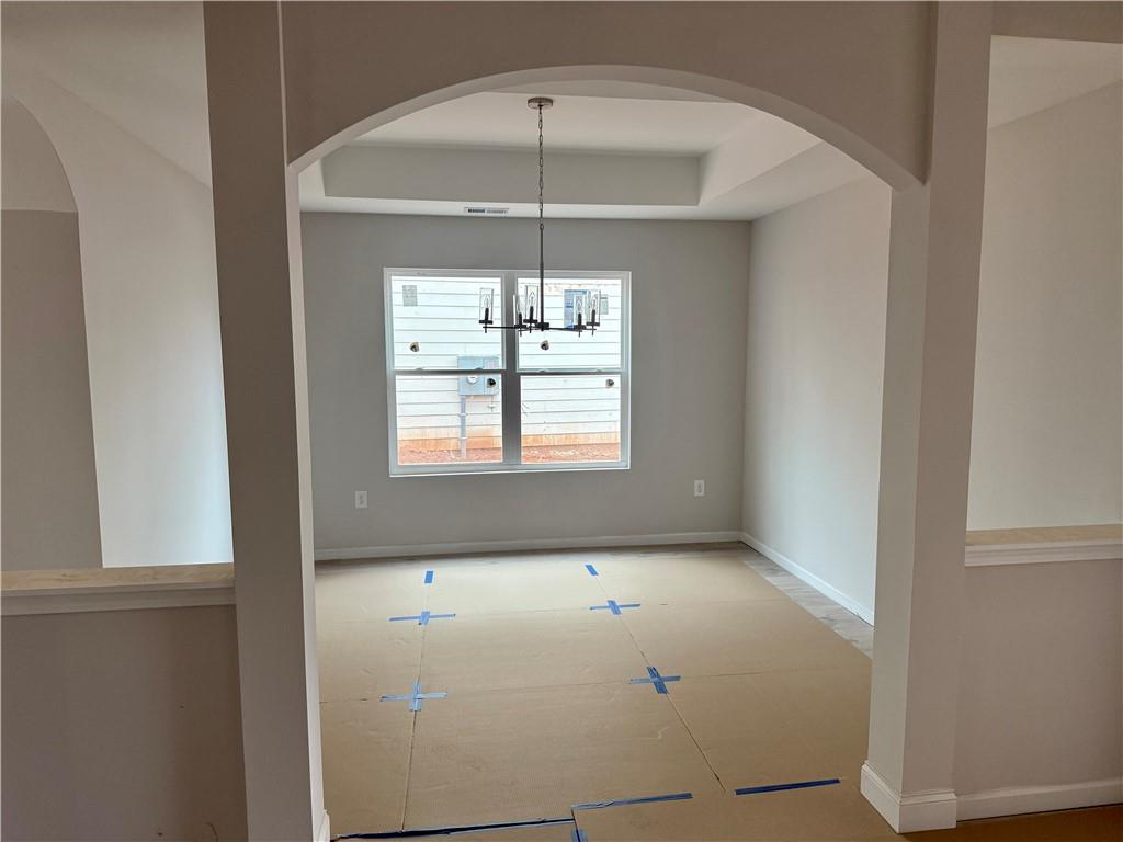 501 Charleston Place Villa Rica, GA 30180 - Photo 4 of 18 a bathroom with a window and a shower