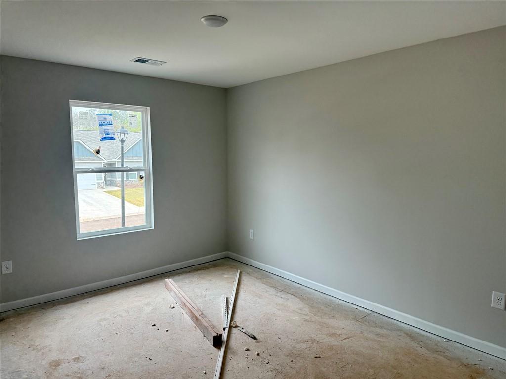 501 Charleston Place Villa Rica, GA 30180 - Photo 7 of 18 an empty room with a window
