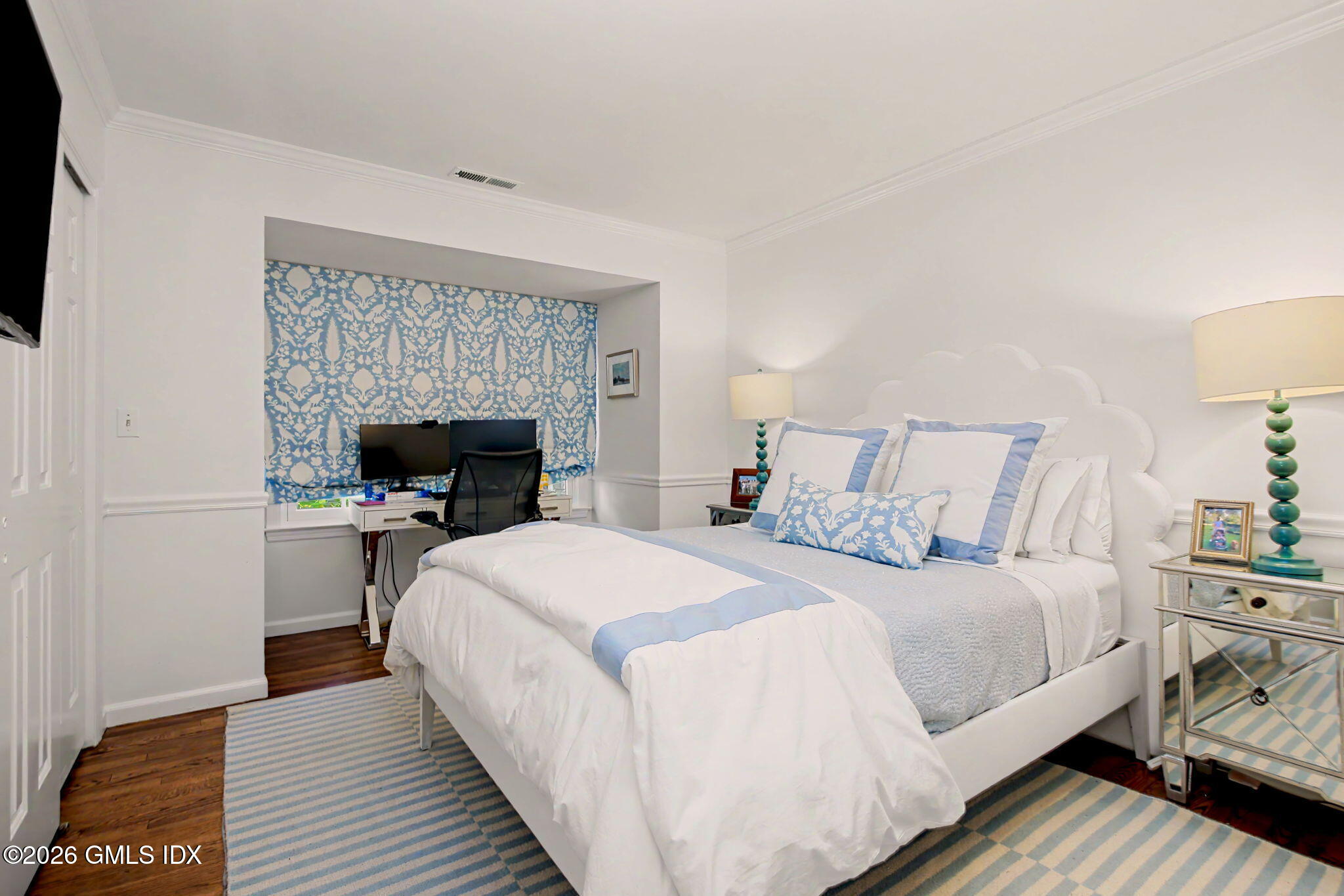 10 Newton Street Riverside, CT 06878 - Photo 20 of 28 a bedroom with a bed and a fireplace