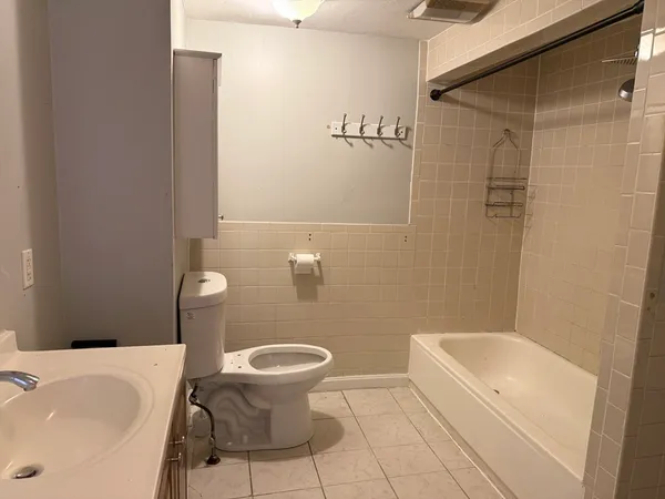 a bathroom with a sink and a bathtub