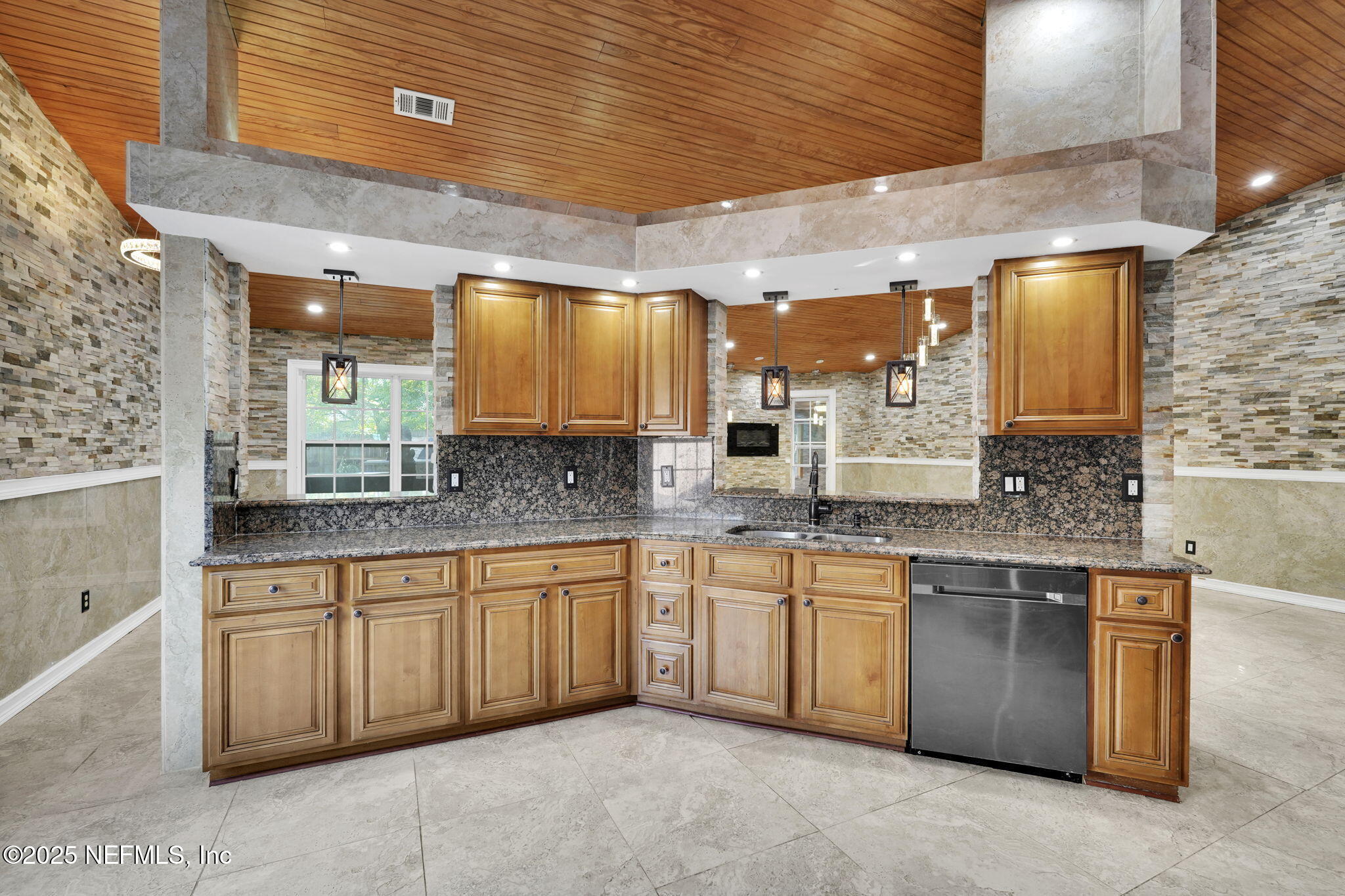 8786 Spring Harvest Lane East Jacksonville, FL 32244 - Photo 16 of 39 a large bathroom with a sink and a large mirror