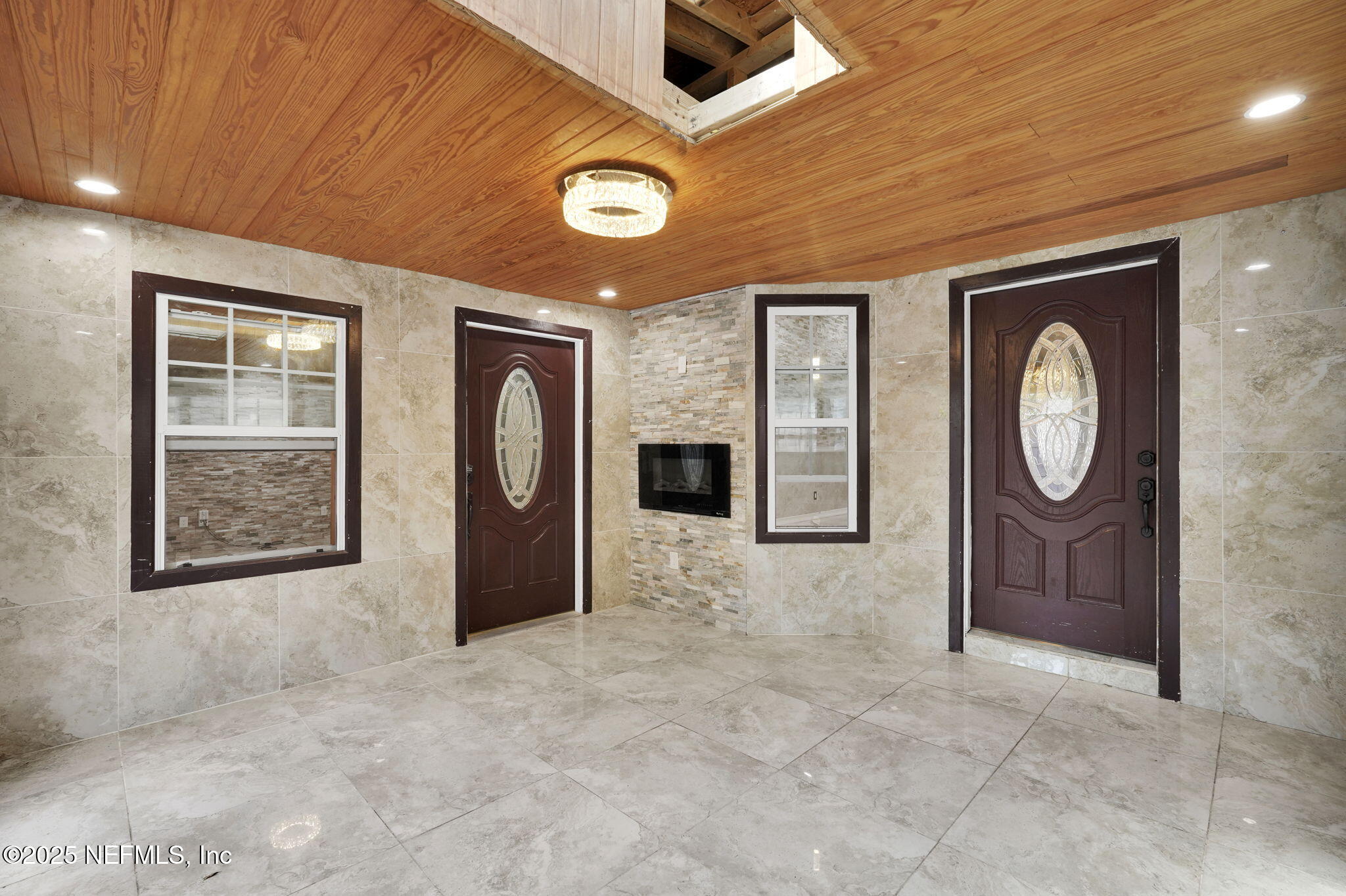 8786 Spring Harvest Lane East Jacksonville, FL 32244 - Photo 19 of 39 a view of a livingroom with a fireplace