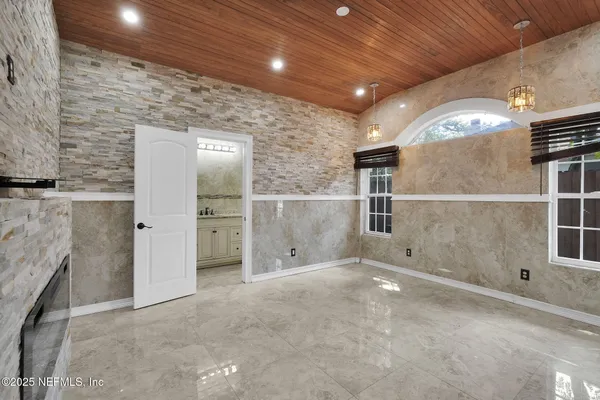 an empty room with windows