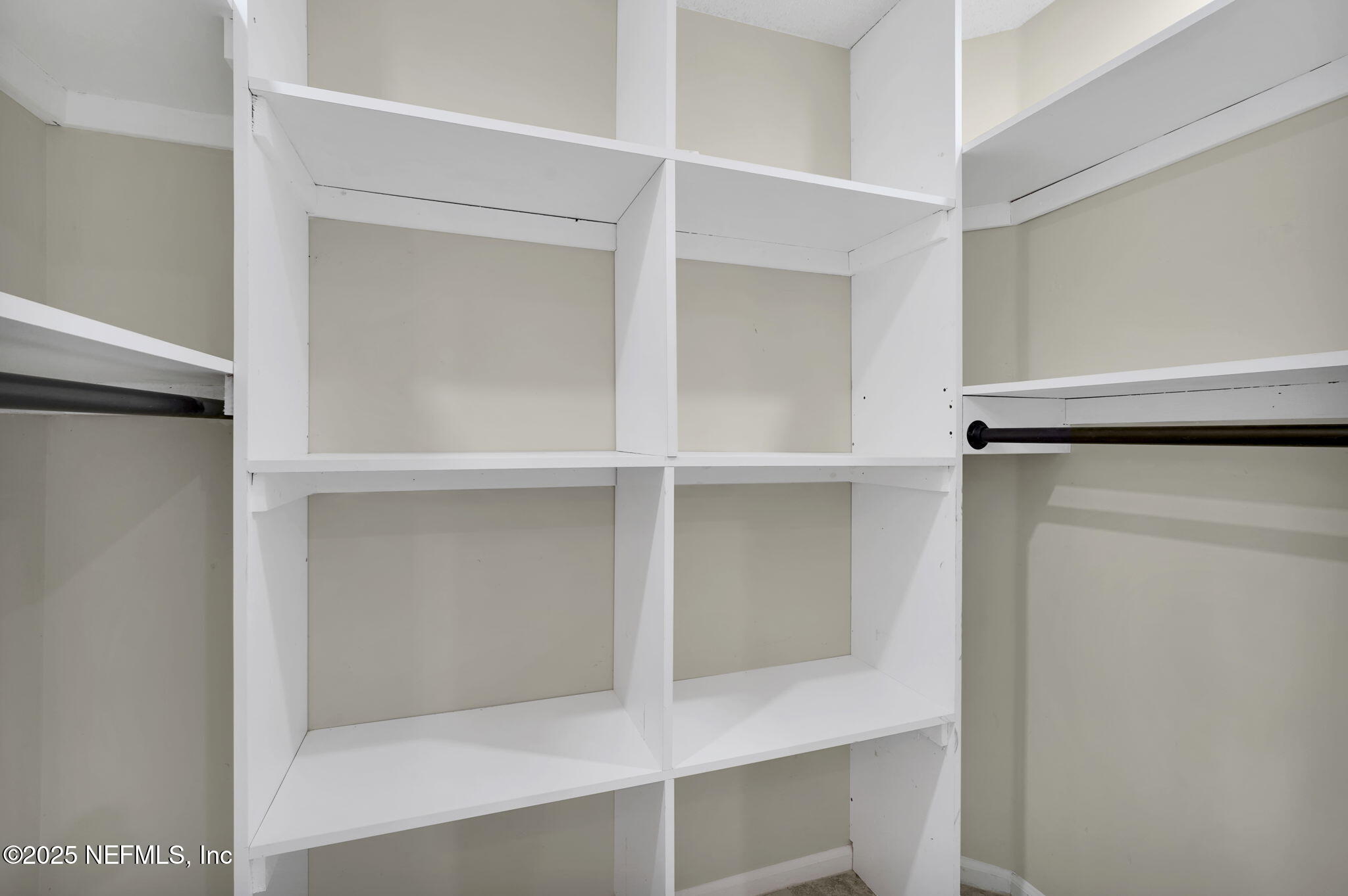 8786 Spring Harvest Lane East Jacksonville, FL 32244 - Photo 24 of 39 a view of walk in closet with empty racks