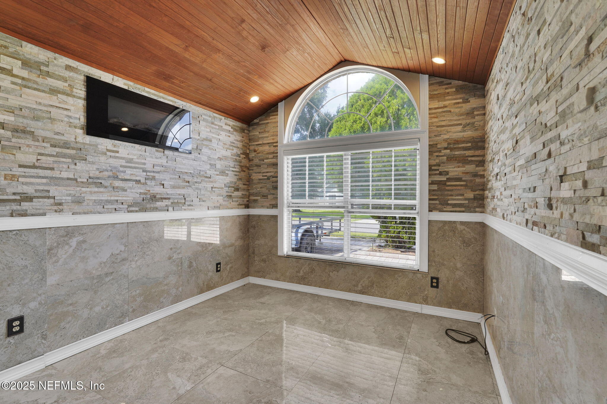 8786 Spring Harvest Lane East Jacksonville, FL 32244 - Photo 29 of 39 a view of livingroom with furniture and flat screen tv