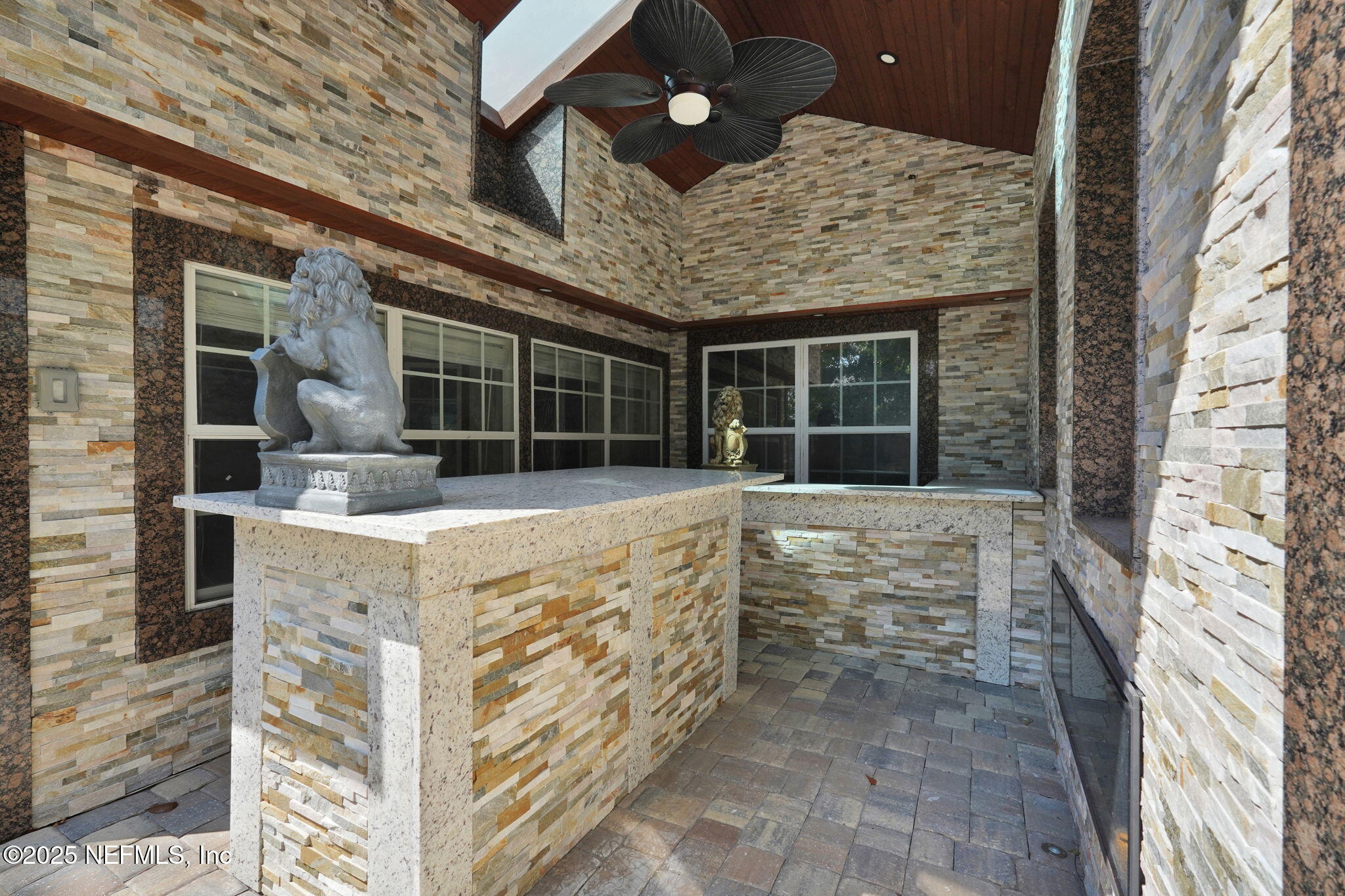 8786 Spring Harvest Lane East Jacksonville, FL 32244 - Photo 33 of 39 front view of house with large windows