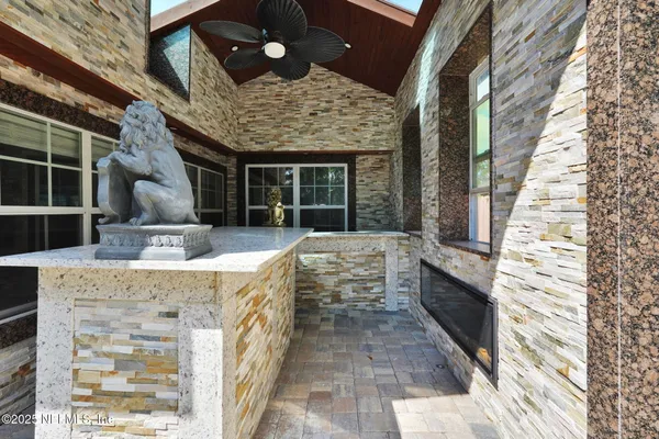 a view of a living room with a large window