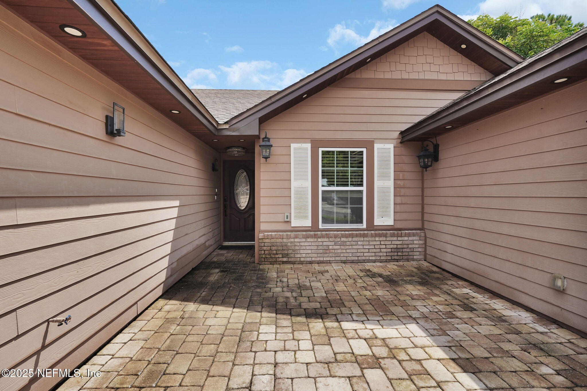 8786 Spring Harvest Lane East Jacksonville, FL 32244 - Photo 6 of 39 a view of a backyard with a door