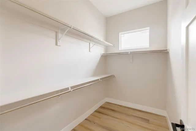 a view of an empty walk in closet