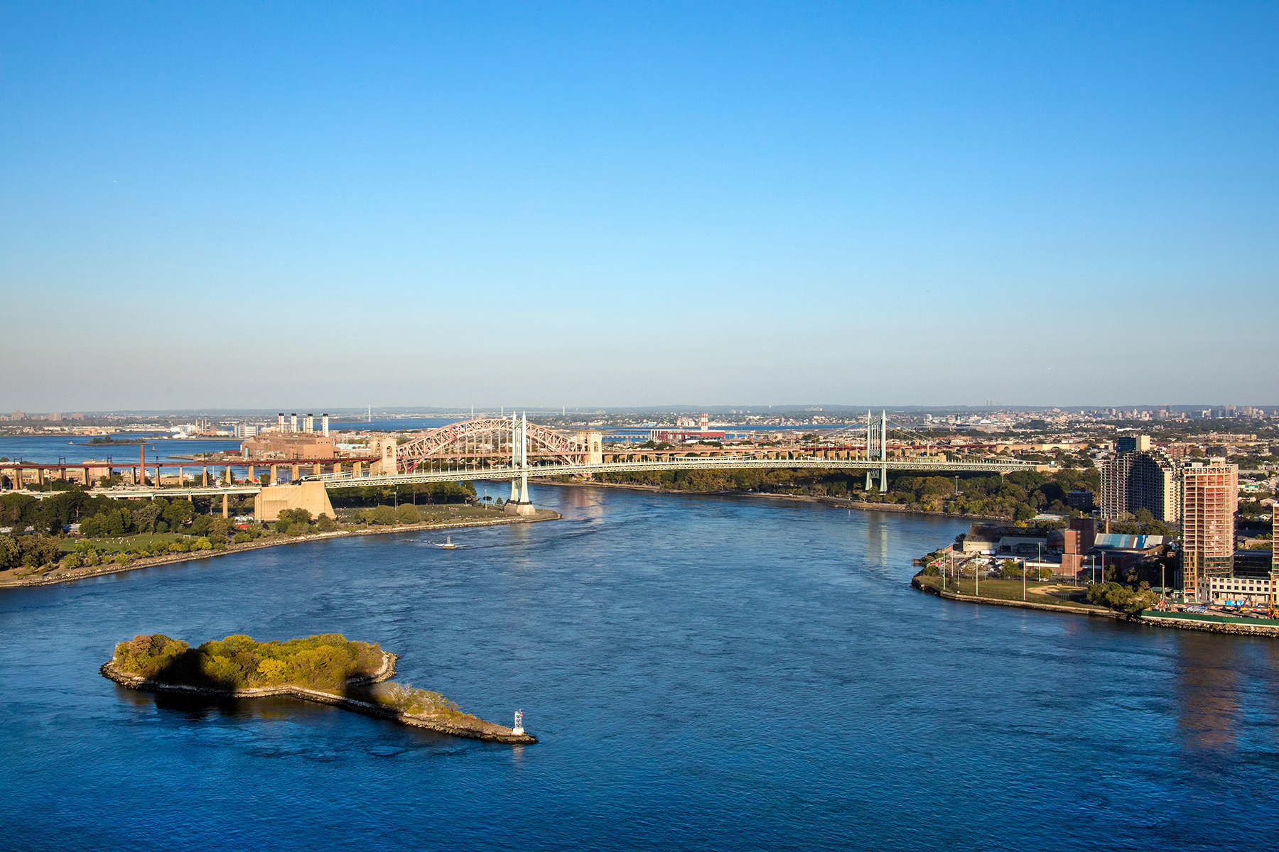 1735 York Avenue, Unit PH35D Manhattan, NY 10128 - Photo 21 of 24 a view of a ocean with boats and trees