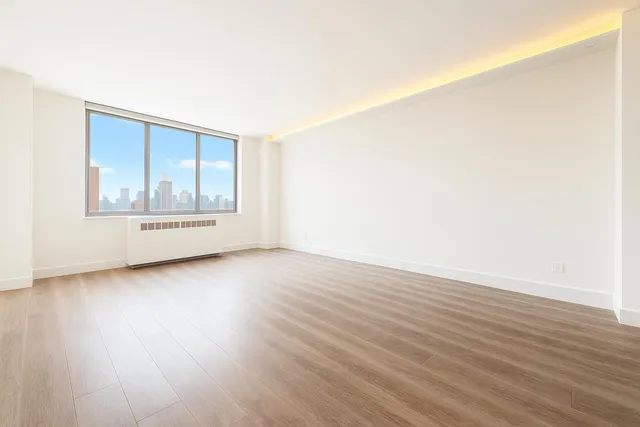 a kitchen with a refrigerator sink and stove