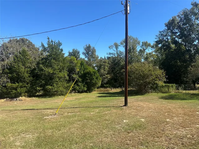 a view of a field with grass
