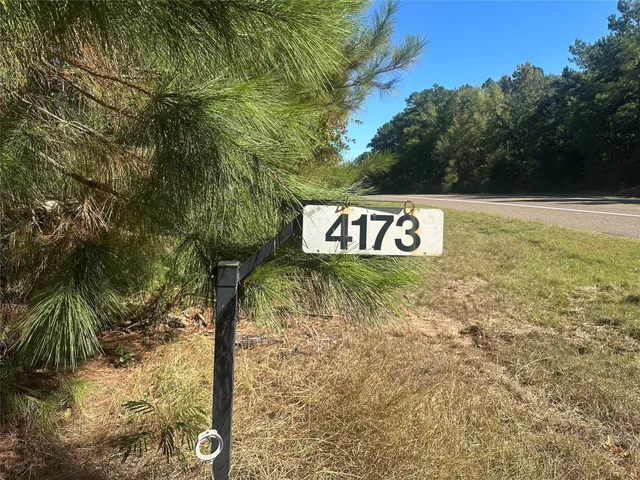 a sign broad on the side of the road