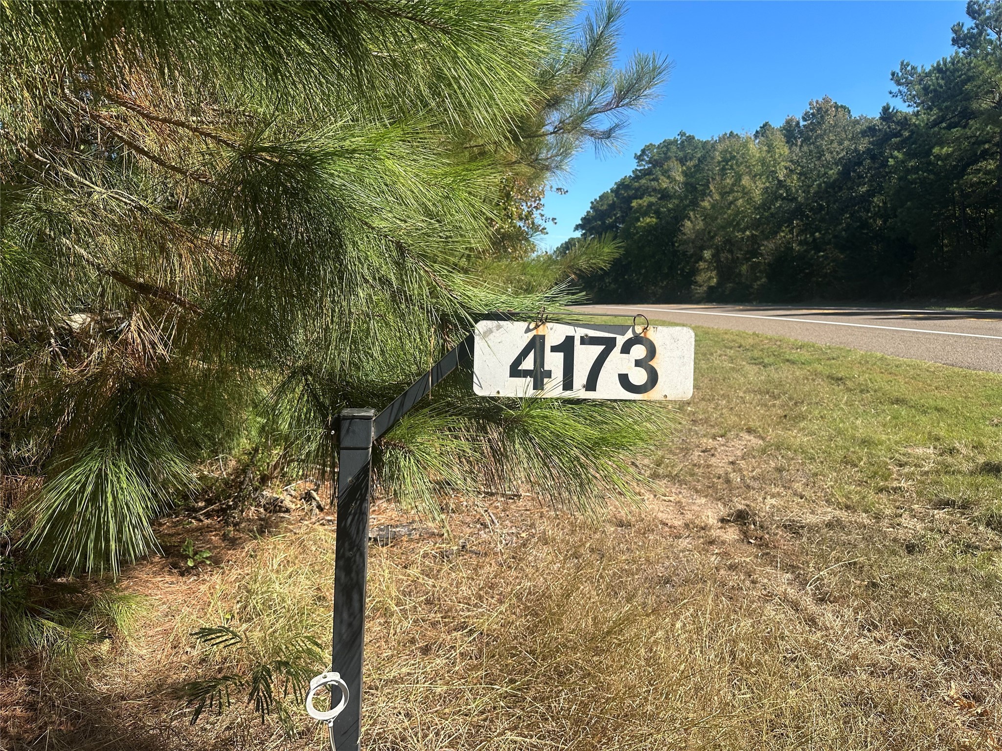 4173 Highway 79 Buffalo, TX 75831 - Photo 15 of 17 a sign broad on the side of the road