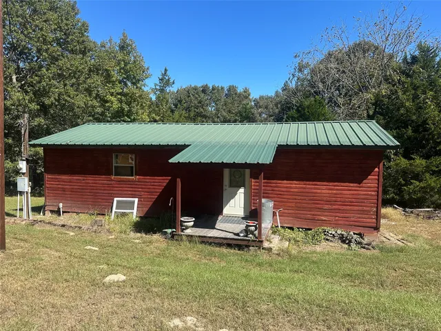 a view of a backyard with a garden