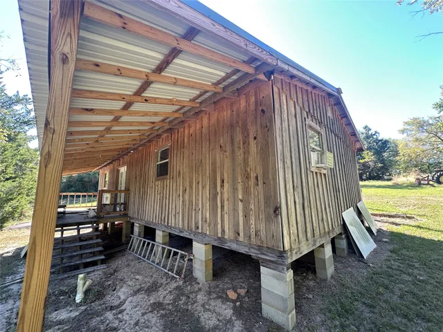 a view of a back yard of the house
