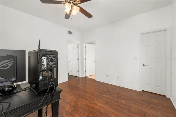 a view of a workspace with furniture
