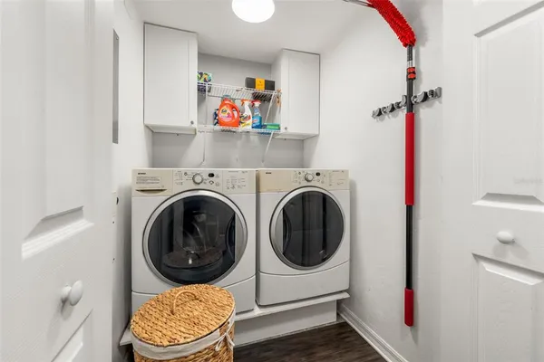 a utility room with dryer and washer