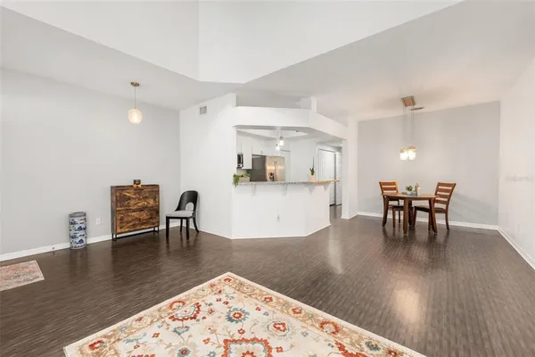 a living room with furniture and a table