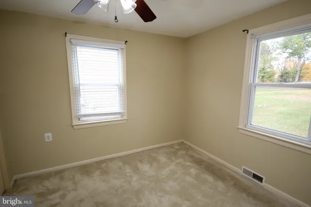 an empty room with a window